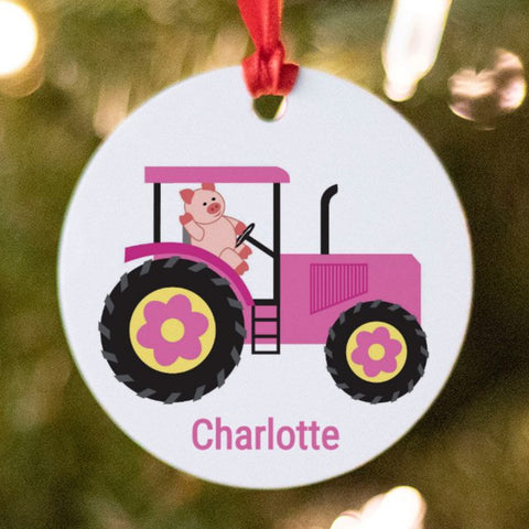Pink tractor Christmas ornament with pig